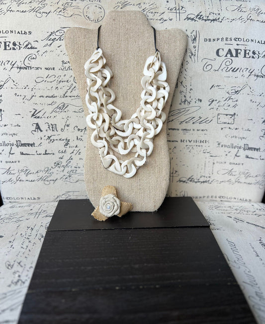 Ivory white statement necklace made of tagua nut from artisans in Ecuador.
Multi layer adjustable necklace. Lightweight jewelry.
For beach cruise.
Gift ideas for mom wife women.
Interlocking chain necklace.
Jewelry for wedding, bride