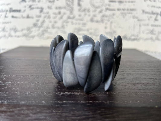 Dark gray statement bracelet made of tagua nut from artisans in Ecuador.
Stretchy bracelet. Lightweight jewelry.
For beach cruise.
Gift ideas for mom wife women.