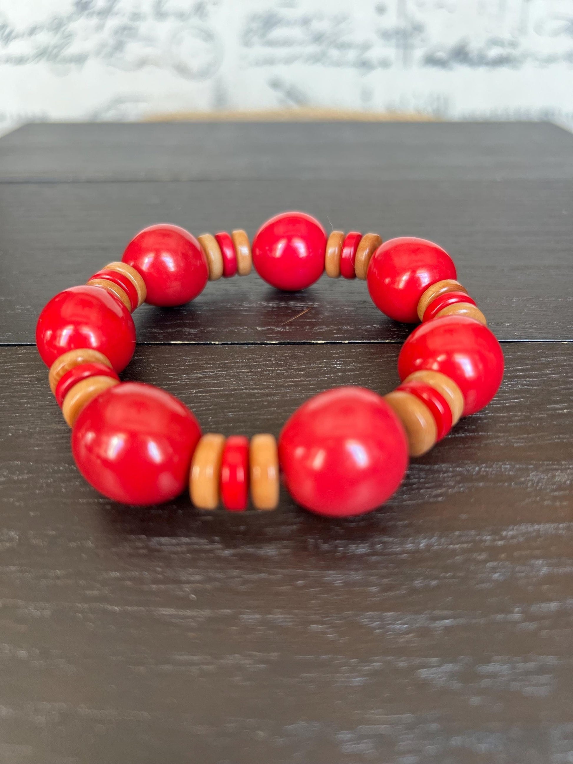 Red and brown statement bracelet.
Handmade beaded bracelet.
Artisan made in ecuador.
Gifts for mom.
Christmas outfit.
Holidays fashion trends