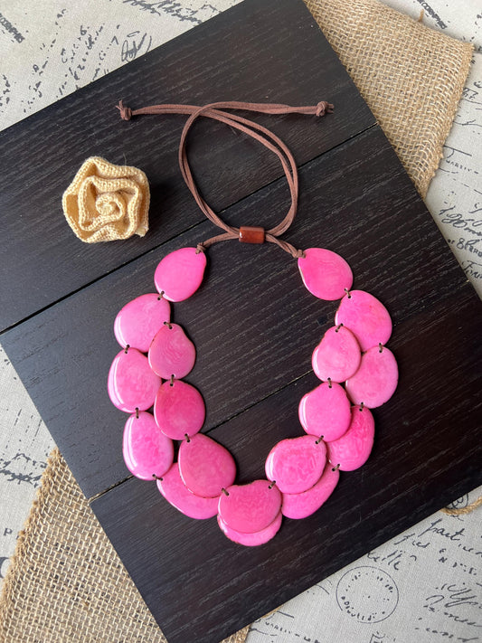Pink tagua necklace.
Double layer necklace, adjustable and lightweight.
Handmade in ecuador.
Statement necklace