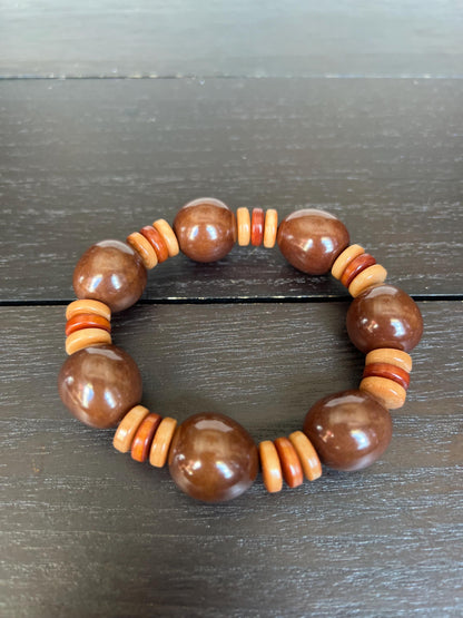Brown statement bracelet Tagua jewelry Big bold bangle Wearable art Elastic stretch bracelet Summer fashion Cruise trends Artisan handmade