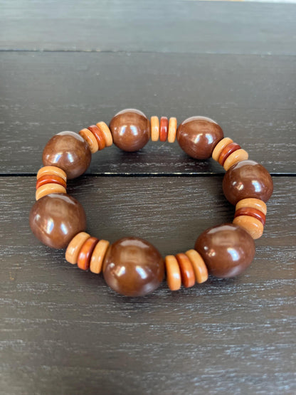 Brown statement bracelet Tagua jewelry Big bold bangle Wearable art Elastic stretch bracelet Summer fashion Cruise trends Artisan handmade