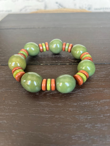 Olive green statement bracelet Tagua jewelry Big bold bangle Stretch elastic bracelet Cruise wear Art to wear Spring handmade fashion