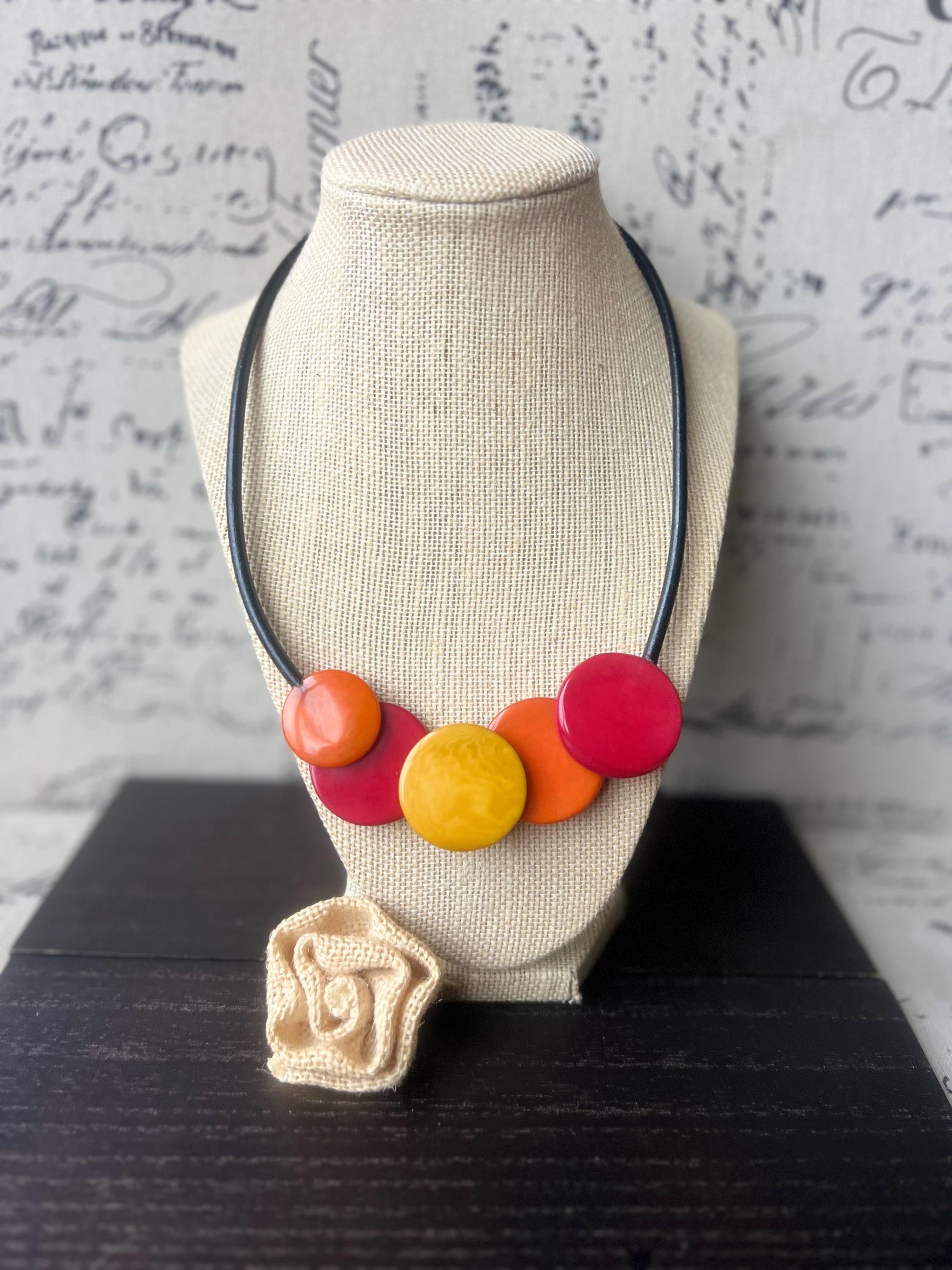 Red yellow and orange necklace.
Tagua necklace.
Statement necklace.