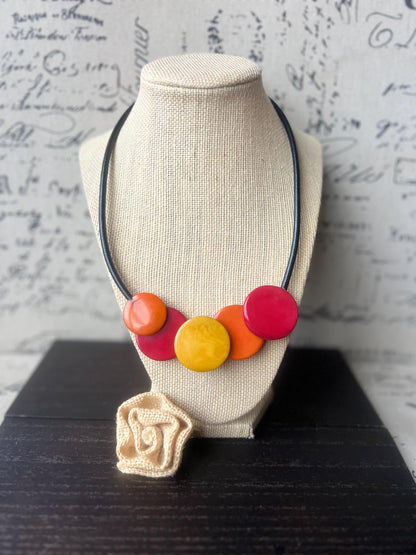 Red yellow and orange necklace.
Tagua necklace.
Statement necklace.