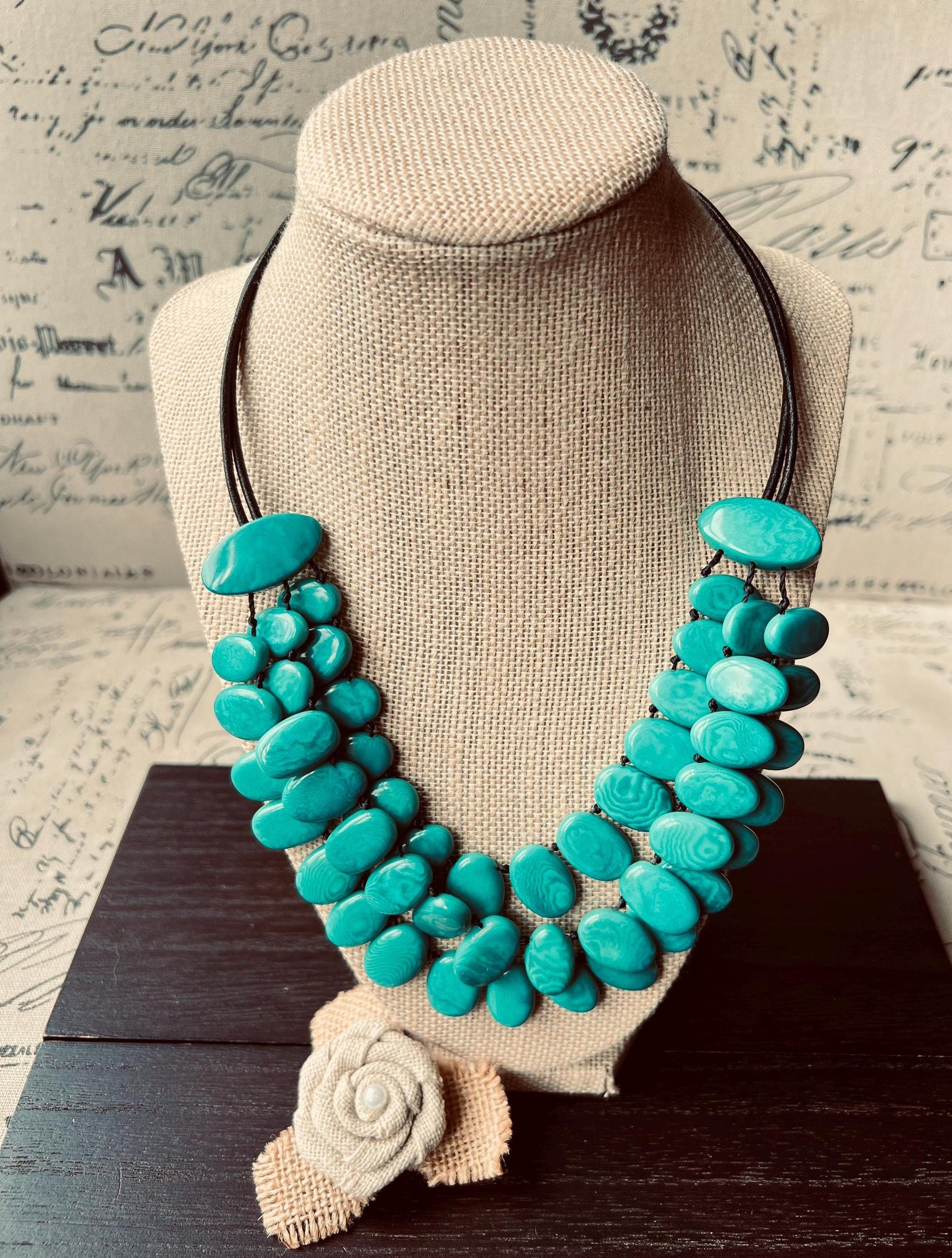 tagua necklace.
turquoise tagua necklace.
statement necklace