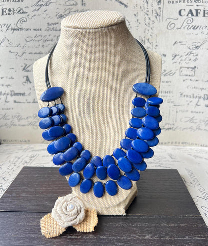 Royal blue necklace.
Statement necklace.
Tagua nut necklace.
Kevin blue necklace.
Statement jewelry