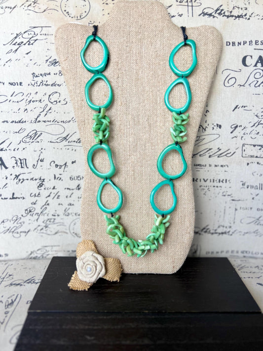 Turquoise green beaded necklace Tagua jewelry Fall fashion 2025 Fall fashion 2025s Statement bead necklace Lightweight jewelry Art to wear