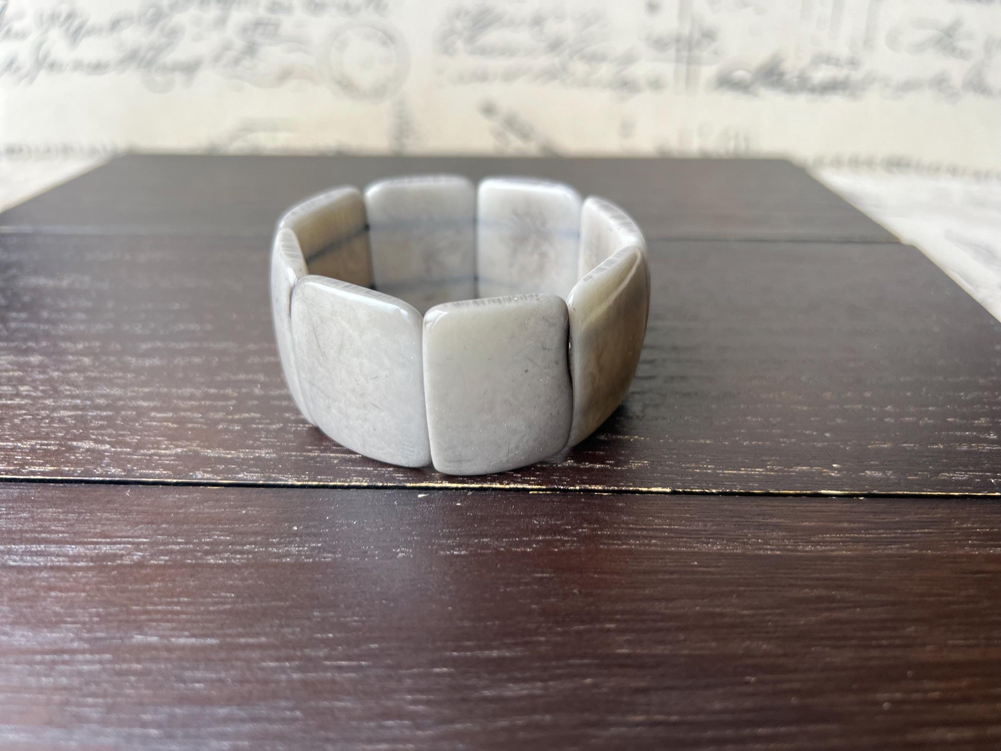 Grey beaded bracelet Tagua nut jewelry Wide cuff bangle Art to wear Elastic stretch bracelet Fall fashion 2025 Wearable art Statement bangle