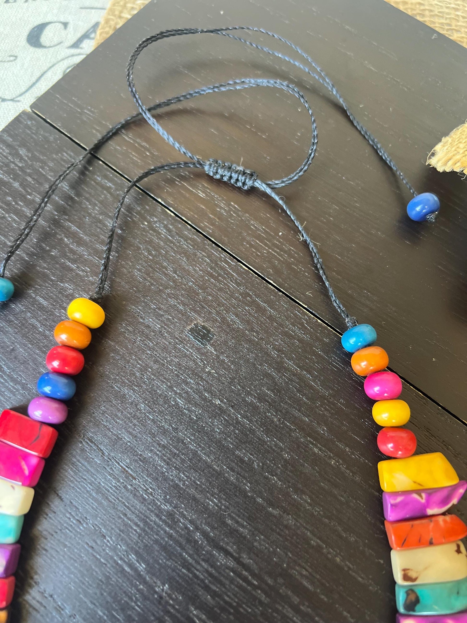 Rainbow statement necklace Adjustable cord Fall fashion 2025 Art to wear Handmade beaded necklace Wearable art Multicolor boho necklace