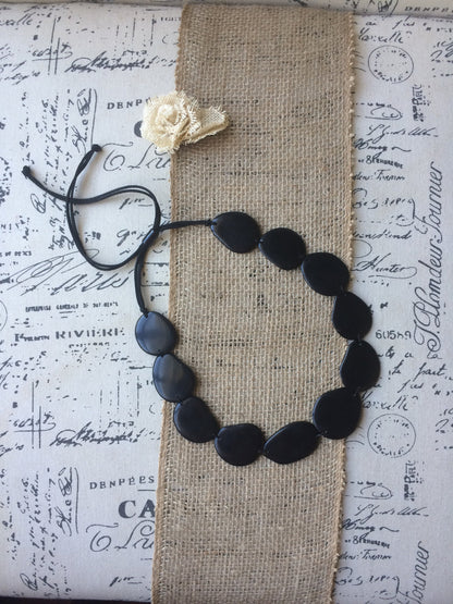 Black single strand statement necklace Tagua nut jewelry Big bold chunky necklace Handmade collar with adjustable leather strap Huge beads