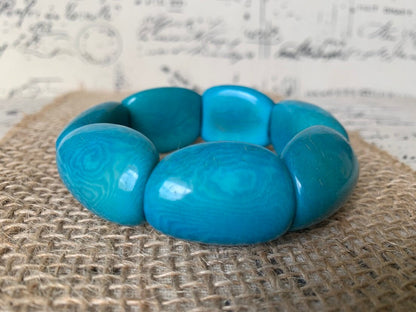 Oversized turquoise beaded bracelet Tagua nut jewelry Wide cuff bangle Handmade stretch bangle Spring jewelry Huge beads Statement handmade
