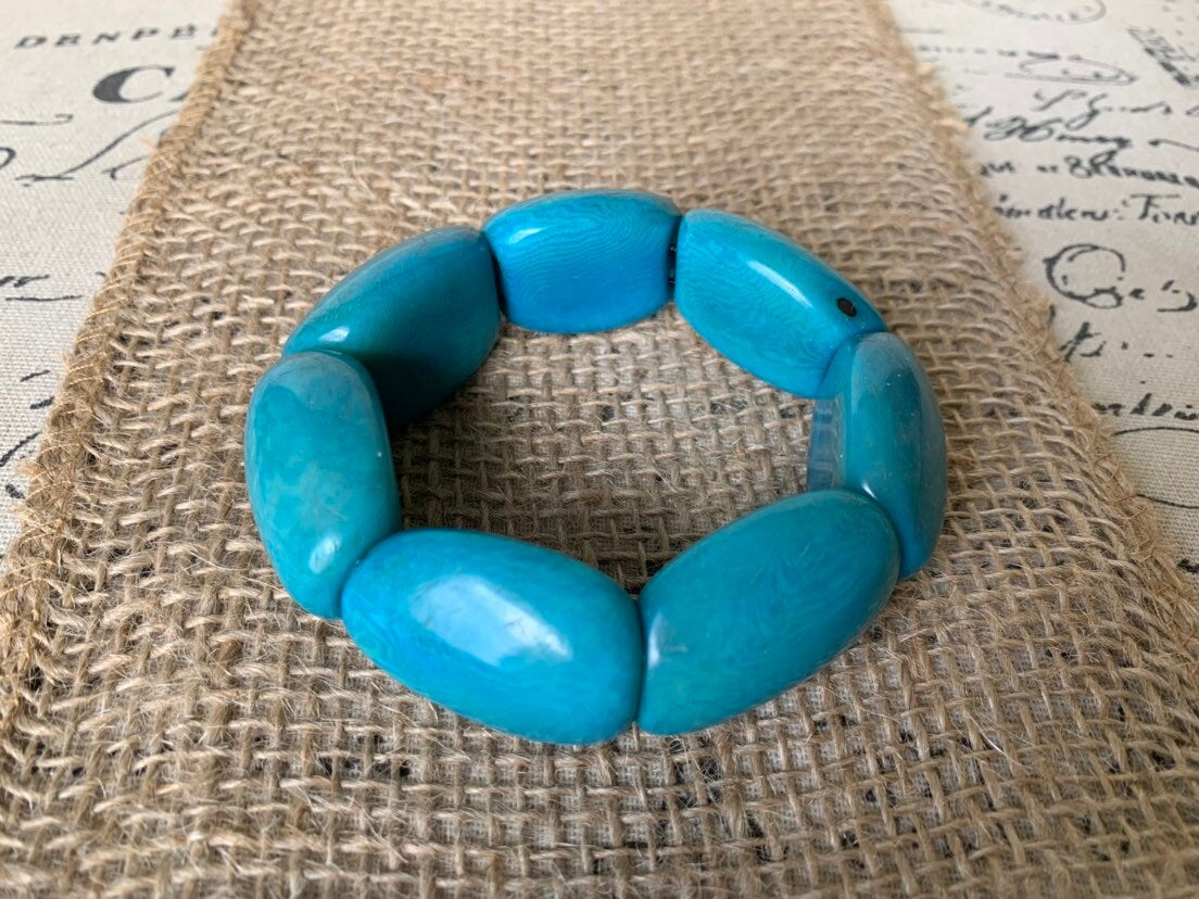 Oversized turquoise beaded bracelet Tagua nut jewelry Wide cuff bangle Handmade stretch bangle Spring jewelry Huge beads Statement handmade