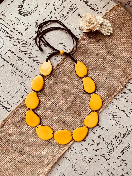 Yellow beaded necklace Tagua nut jewelry Long bib collar with adjustable leather straps Presents from Ecuador for Fall fashion trends