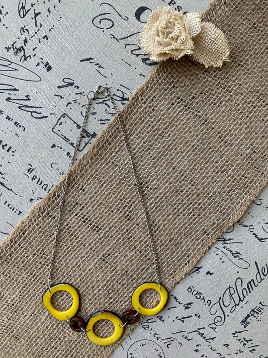 Yellow Tagua nut necklace with silver chain Resort wear Lightweight jewelry Statement handmade beads Spring fashion trends Beach style