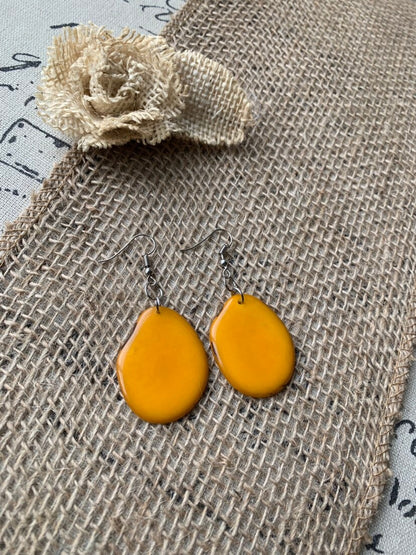 Mustard yellow earrings Tagua jewelry Statement dangle drops Summer fashion trends Artisan handmade in Ecuador Mod unusual trendy For beach