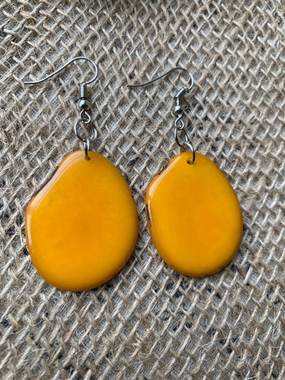 Mustard yellow earrings Tagua jewelry Statement dangle drops Summer fashion trends Artisan handmade in Ecuador Mod unusual trendy For beach