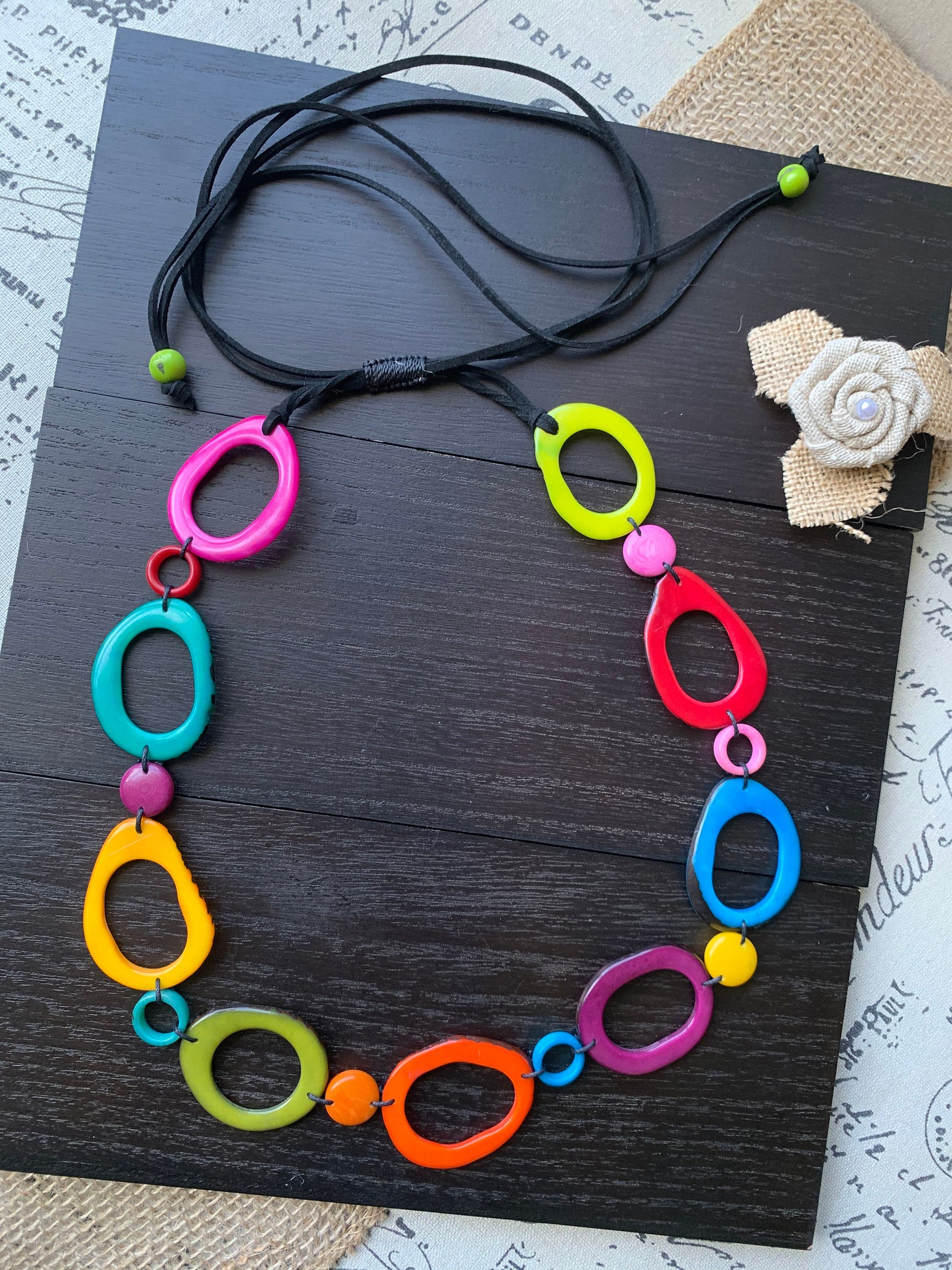 Rainbow statement necklace Tagua necklace Geometric jewelry Donut shape bead Spring fashion Anniversary gift for wife Lightweight adjustable