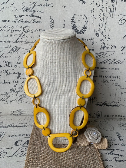 Yellow tagua necklace Statement geometric jewelry Handmade donut shape beads Fall fashion trends Boho mod adjustable collar For wedding