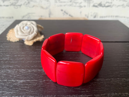 Red statement bracelet Tagua nut jewelry Big bold bangle Spring fashion Wide cuff bangle Beaded stretch bracelet Elastic bangle Organic