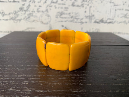 Yellow beaded stretch bracelet Tagua nut Jewelry Fall fashion trends Big bold beads Wide cuff bangle Beach style trends Anniversary gifts