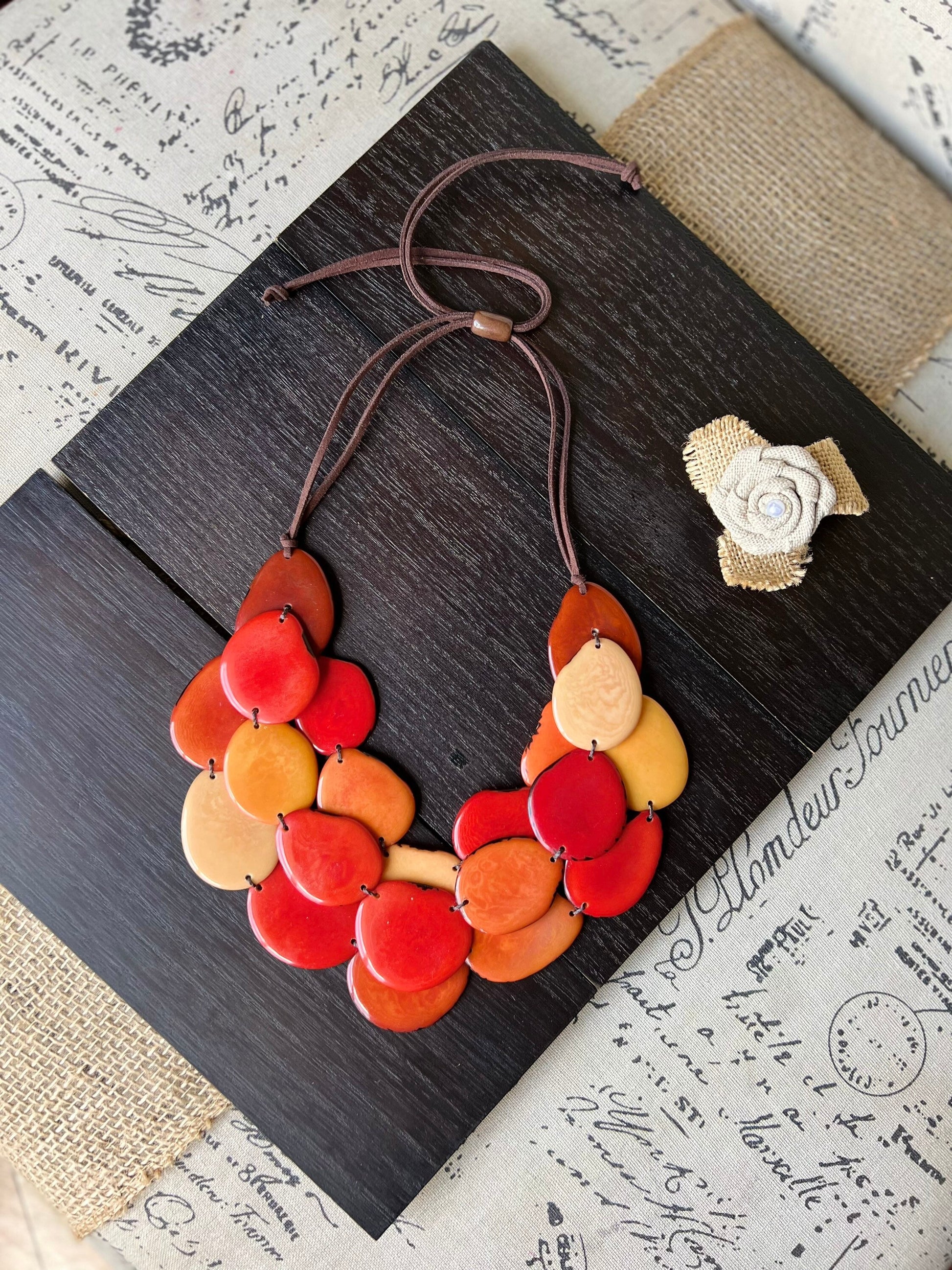Burnt orange huge beaded necklace Tagua nut jewelry Big bold chunky necklace Triple 3 strands bib collar Adjustable leather straps Organic